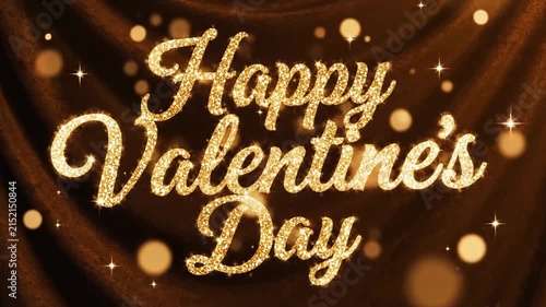Golden glitter text on a dark brown fabric background scene