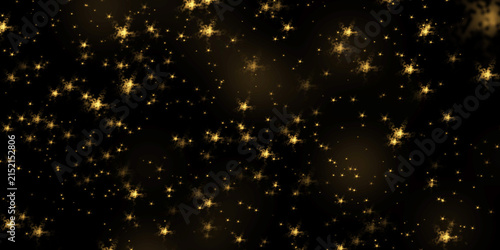 Dark night sky filled with many small sparkling golden glowing star patterns