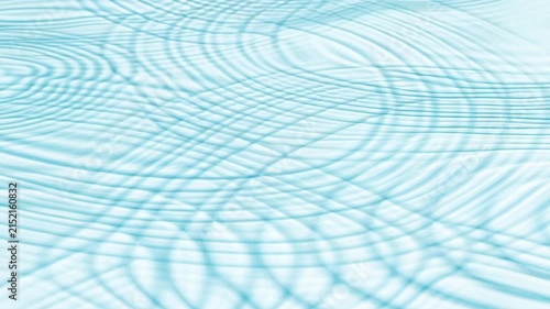 Slow motion tracking shot of ripple patterns shifting and intersecting across shallow water surface in studio pool with soft cyan lighting