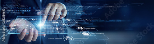 фотографія Technology lead researcher handholds virtual screen displaying futuristic data and touches Computer Science system controls for comprehensive optimization
