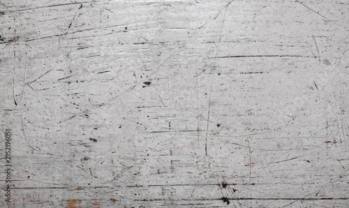Dark grunge texture on old weathered white painted wooden planks