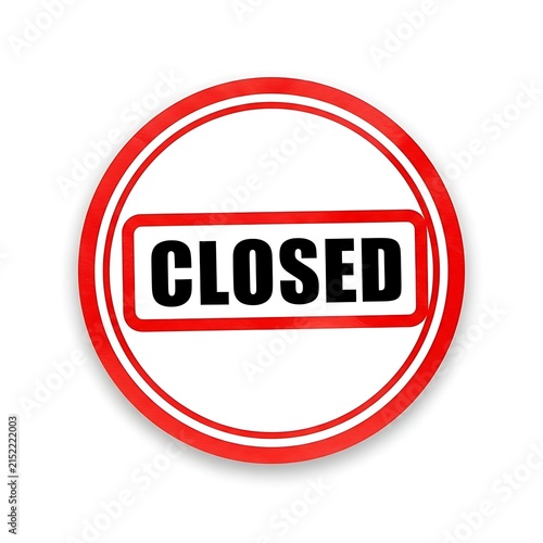 Red circular closed sign with bold black text