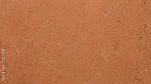 Rustic terracotta clay wall texture background