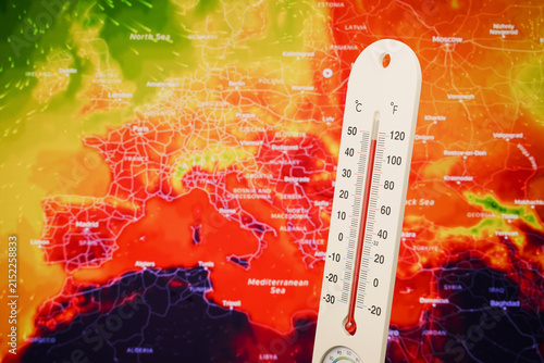 Canvas Print Thermometer showing extreme high temperature on a red European weather heat map background, symbolizing global warming, climate crisis, and severe summer heatwave in Europe