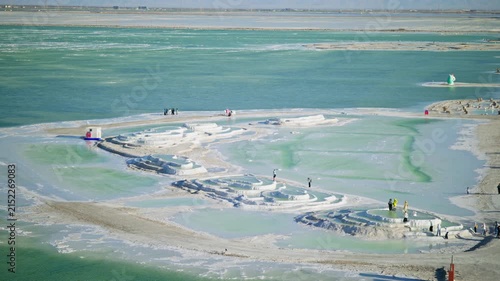 Aerial View of Bishui Yaotai Formation in Qarhan Salt Lake: Emerald Green Water, Sunset Glow and White Salt Crust in Qinghai