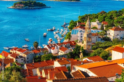 Hvar town and Pakleni Islands viewed from the medieval Spanish Fortress, golden hour over the Adriatic sea, Croatia.