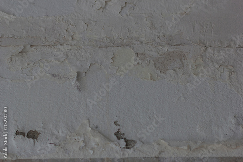 Quadro su tela Abstract grunge texture of old peeling white paint on a weathered wall