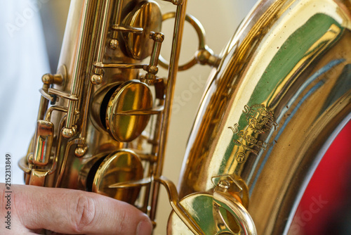 A close-up of a gleaming golden saxophone