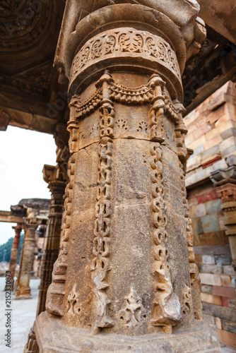 Close up of ornate stone pillars - Qutb Minar complex in Delhi, India, Asia