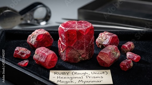 Vibrant Rough Uncut Ruby Gemstones Displaying Natural Hexagonal Crystal Prisms from Mogok Myanmar