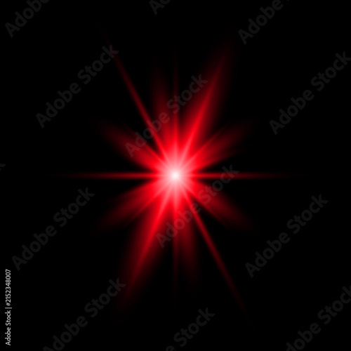 A bright red lens flare light effect isolated on a black background for creative digital design projects