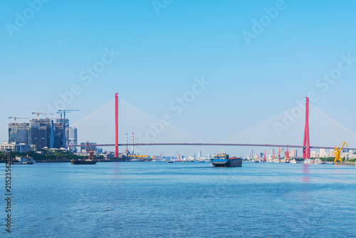 The skyline of modern urban architecture in Shanghai, China, and the scenery of Yangpu Bridge and Huangpu River	
