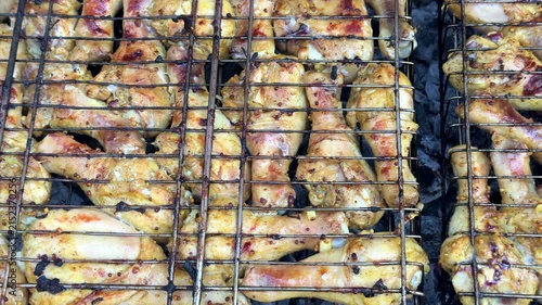 Cooking chicken legs on fire
