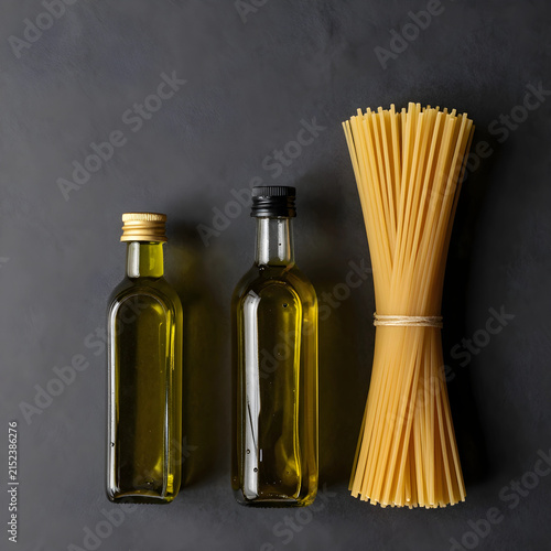 Two bottles of olive oil an...