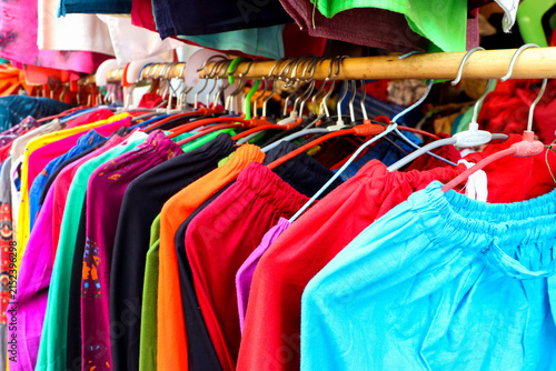 Colorful Women’s Clothes Hanging on Rack in Boutique Store