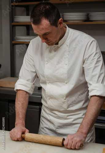 Male chef in white uniform ...
