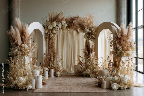Romantic Wedding Arch with Dried Florals and Neutral Drapery