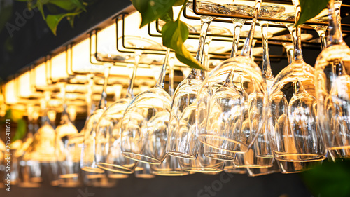 Sticker Clean Wine Glasses Hanging Above Bar Counter Close Up