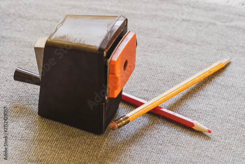 Obraz na płótnie Pencil sharpener with two pencils