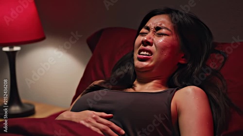 Distressed Woman In Bed Experiencing Painful Agony 4K