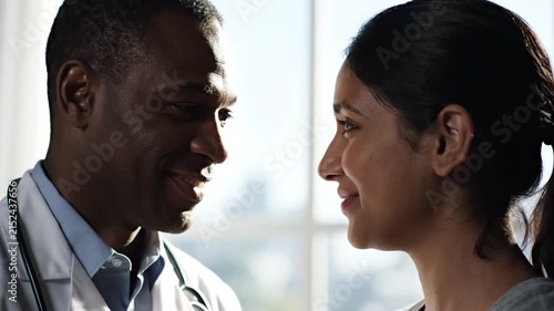 Diverse Doctor And Patient Conversation In Bright Natural Light 4K