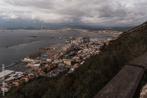 Panoramic high angle view of the Bay of Gibraltar, harbor, and cityscape from the Rock of Gibraltar