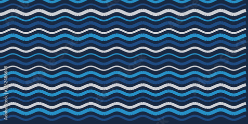 Foto Abstract seamless wavy lines pattern in blue and white tones.
