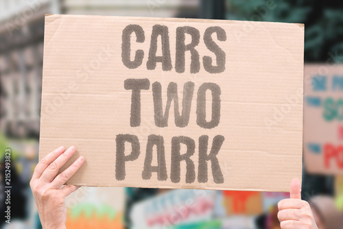 Fotografie "Cars two park" One empty space is taken by two drivers, creating a chaotic search
