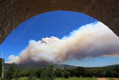Wildfire Smoke Rising Behind the Hills