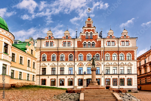 Russia, Vyborg city, October 14, 2024, - ancient, famous, old town hall square overlooking the city hall. In the center of the square is a monument to the founder of the Vyborg fortress, Swedish Marsh