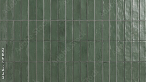 Deep sage green glazed ceramic wall tile texture with subtle surface variations
