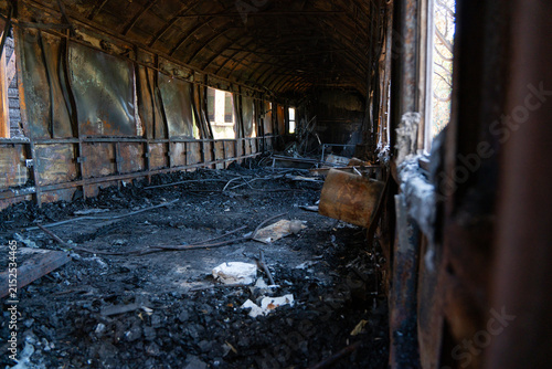 Obraz na plátně Abandoned Burned Train Car in Railway Yard