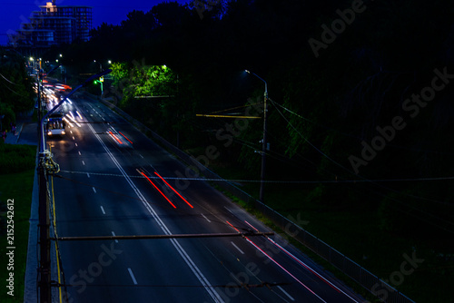 Trail lights of the cars at city street. Long exposure