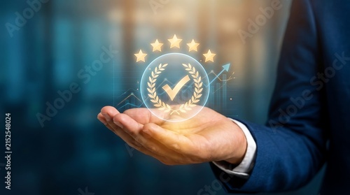 Businessman holding a five star quality rating hologram for customer service excellence
