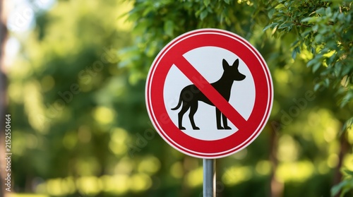Prohibition sign showing dog silhouette in public park