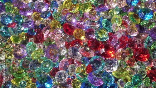 Colorful Sparkling Gemstones Background with Shining Crystal Diamonds.