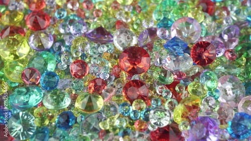 Colorful Sparkling Gemstones Background with Shining Crystal Diamonds.