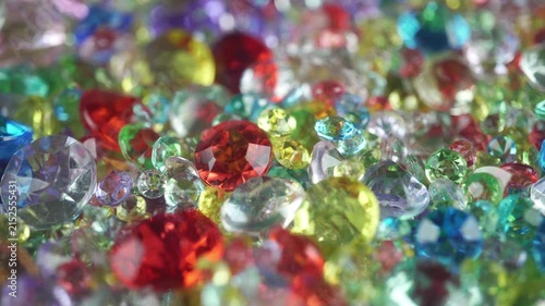 Colorful Sparkling Gemstones Background with Shining Crystal Diamonds.