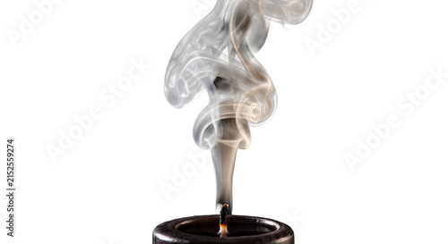 Cuadro en lienzo Wispy smoke curls upwards from a dark candle wick against a white background