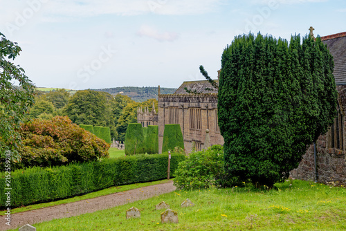 Historic Lanhydrock Estate Gardens with Topiary Hedges and Stone Manor