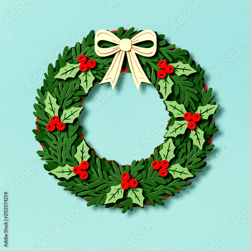 Paper-cut evergreen wreath with holly and berries / festive kirigami art

