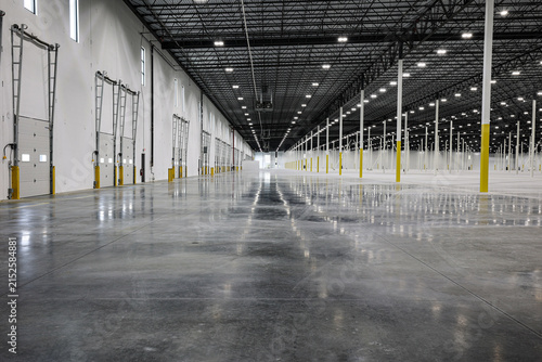 Modern Empty Distribution Center Interior with Polished Concrete Floor