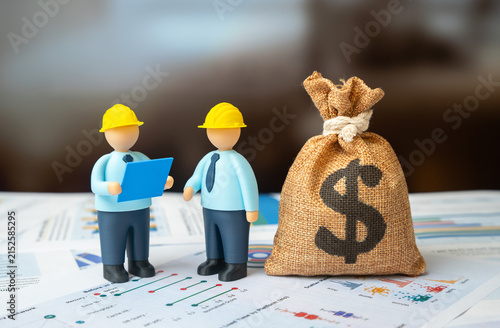 Engineers with blue drawings and a dollar money bag. Design and engineering work. Infrastructure repair. Budget and construction.