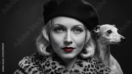 Elegant Woman Looks Up with Whippet Canis lupus familiaris
