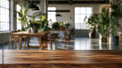 Rustic wooden table in sunlit, plant-filled loft interior