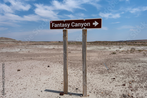 Fantasy Canyon sign with desolate background