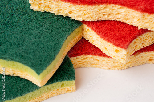 Close-up of kitchen cleaning sponges with abrasive scouring pads.