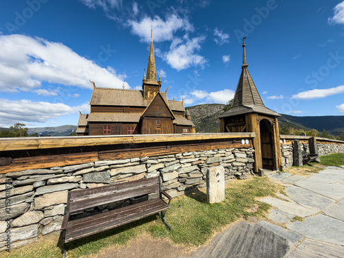 Obraz na płótnie Stone churchyard wall and gate at Lom stave church, Norway