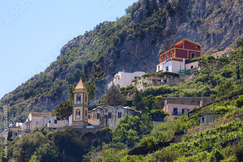 Amalfi Coast Village and Church with bell tower in Italy.