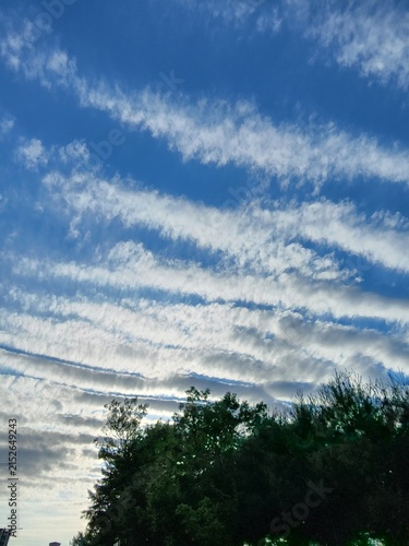 Canvas Print clouds over the blue sky